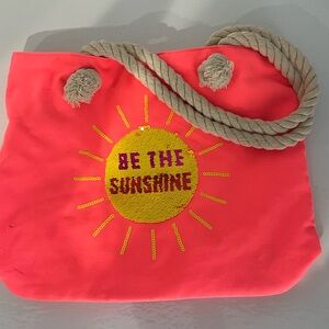 Hot pink tote bag.